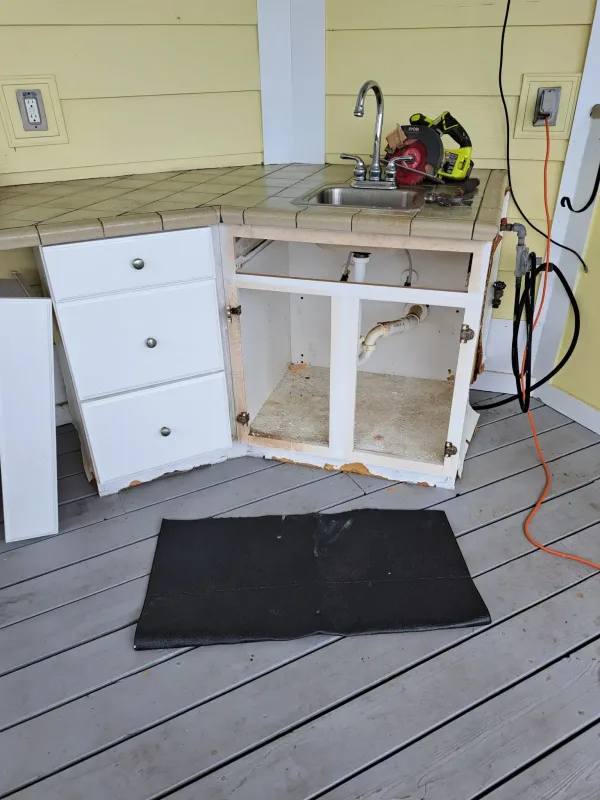 Cabinet repair/replacement — before